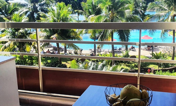 Arue Appartement | Tahiti Arue Suite F2 bord de mer accès offerts piscine spa salle de sport
