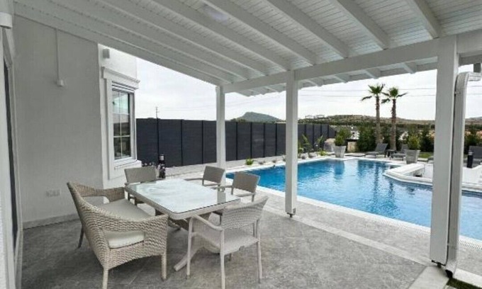 Foca Villa | Sunken seated fire pit villa!