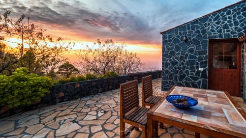Garafia Maison | sunset and stars stone house
