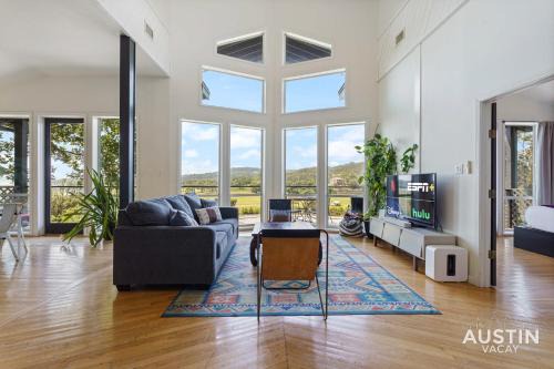 Lower Basin Lake Travis Maison | Sunset Waterfront 4BR 2BA w Pool and River Near Lake Travis by Austin Vacay