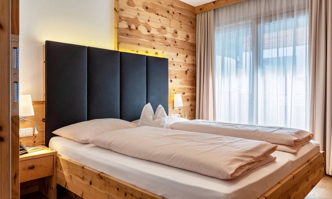 Gudon Appartement | Appartement supérieur 'Marialisa Apt Orchidee' avec vue sur la montagne, jacuzzi & Wi-Fi