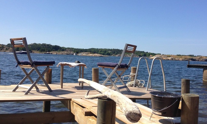 Stromstad Maison | Maison de bon goût avec un terrain naturel en bord de mer
