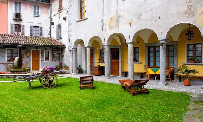 Cannobio Appartement | Appartement 1 chambre meublée avec goût avec terrasse et jardin privé