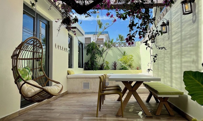 Parque Maison | The Bungalows by HOUS offer a lush tropical paradise perfect for a relaxing getaway.