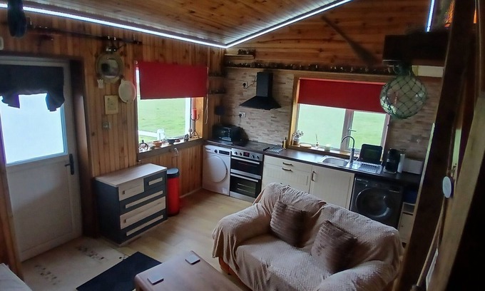 Saula Appartement | THE DEN, BELMULLET: Stables studio apartment. Mezzanine. Tranquil and Rural