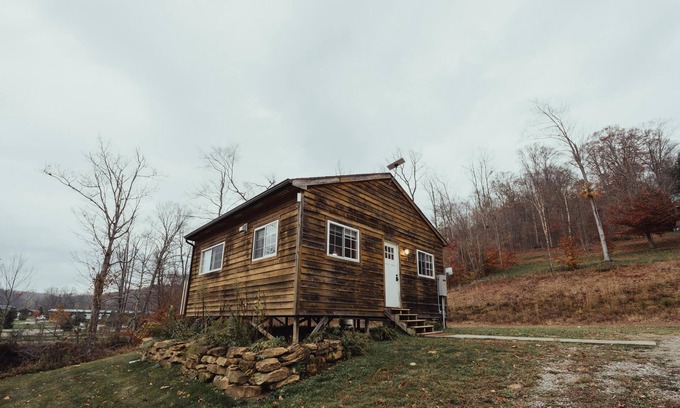 South Bloomingville Cabine | The Hideout - Escape to The Hideout in Hocking Hills, OH! This cozy, pet-friendly cabin offers a private deck by Pine Creek, just minutes from hiking, waterfalls, and caves. Perfect for up to 4 guests. Book your nature-filled getaway today!