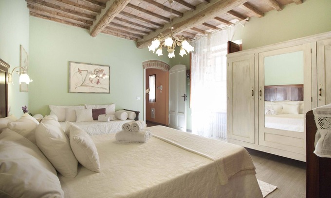 San Gimignano City Centre Appartement | La maison est située au coeur de la Toscane, dans le centre historique de San Gimignano.