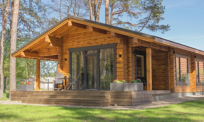 Klykiai Maison | The house is located in a quiet area, surrounded by forest pines.