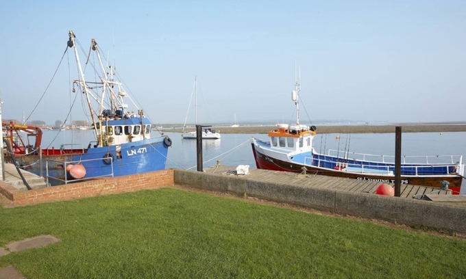Wells-next-the-Sea Cottage | Les Normands est une maison de vacances de trois étages située dans le centre de Wells-next-the-Sea.