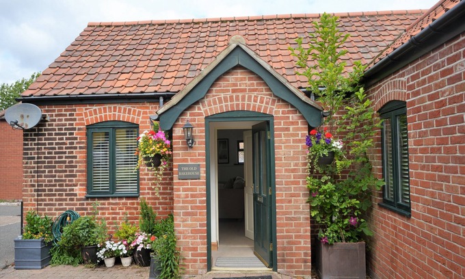 Sheringham Maison | The Old Bake House - magnifiquement présenté, propriété au rez-de-chaussée à quelques mètres des boutiques et des cafés