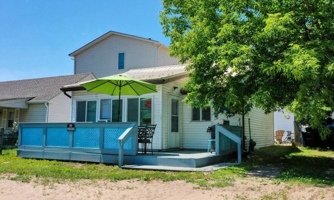 Irving Maison | The Pietroman: Cottage in Sunset Bay with Fire Pit