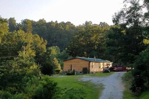 Genoa Maison | The Sandstone - A 3BR, 2BA Deluxe Log Cabin