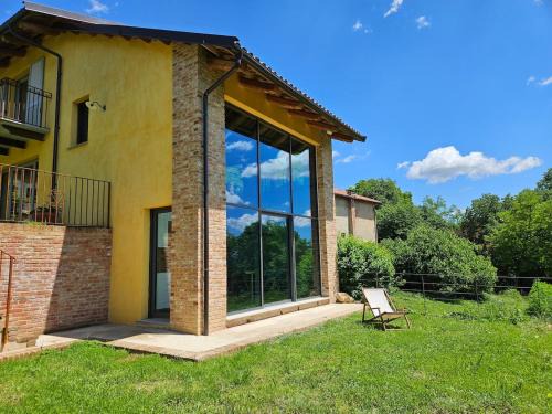 Capriglio Maison | The Window on the Forest View