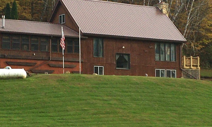 Richland Center Maison | This 3 story home is set on a hillside & includes all imaginable amenities.