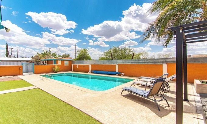 The Garden District Appartement | This centrally located 1 bedroom features a full size pool and electric vehicle charging on site.