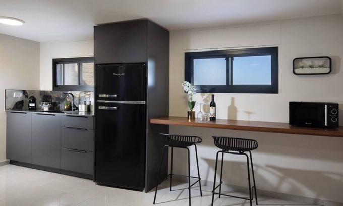 Tiberias Appartement | This cozy apartment offers ample space, featuring a comfortable living room perfect for relaxation