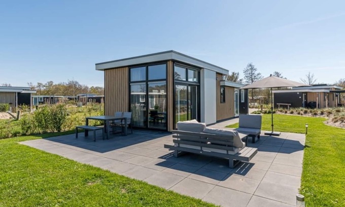 Burgh-Haamstede Maison | Ce chalet moderne avec finition 'Style plage' est situé sur un terrain spacieux et peut accueillir 4
