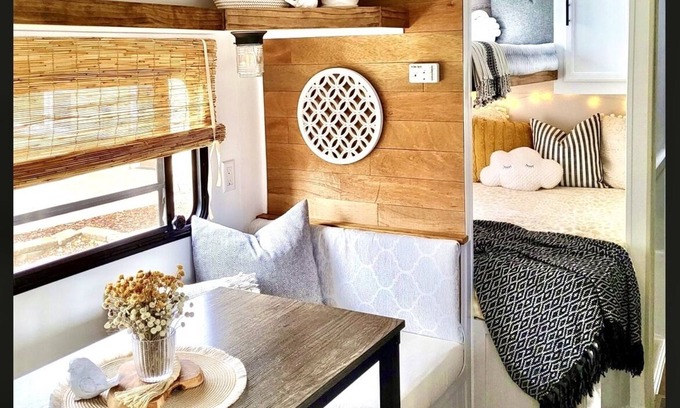 Leeds Maison | Modern RV beautifully remodeled from the inside out w/ barn door master bedroom
