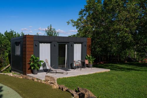 Kobyli Appartement | TINY HOUSE mezi sklepy