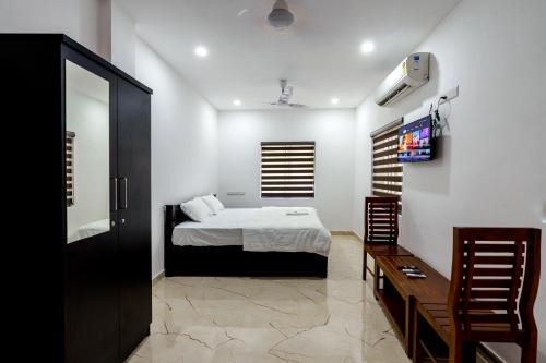 Kochi Hôtel | TLTA Residency