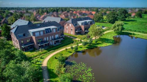 Rhauderfehn Appartement | Tomkes Ferienwohnung am See