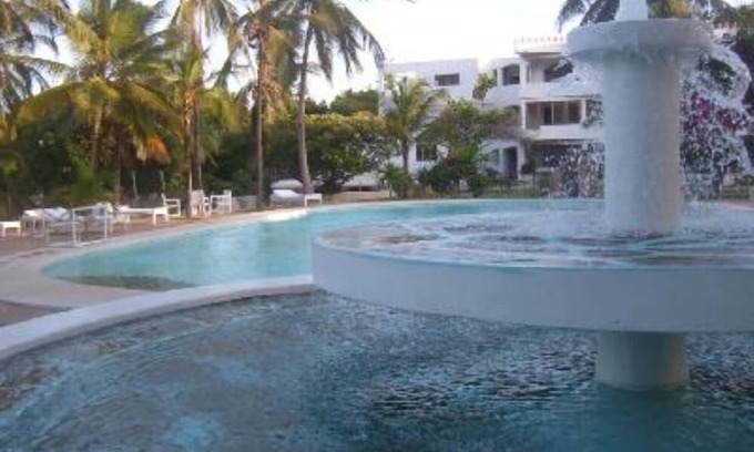 Malindi Appartement | Plage/ Ville/confortable appartement,gym,piscine,chaises longues, Jardin