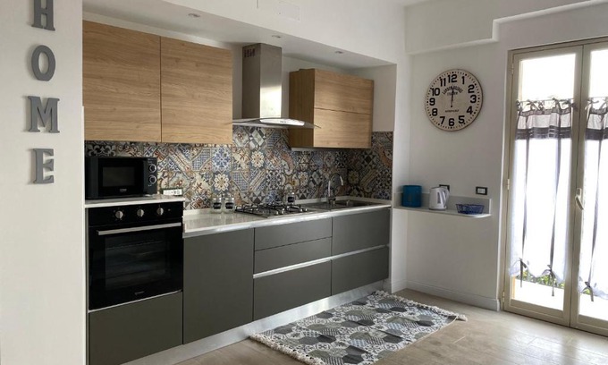 Torre di Faro Appartement | Tra mare e lago