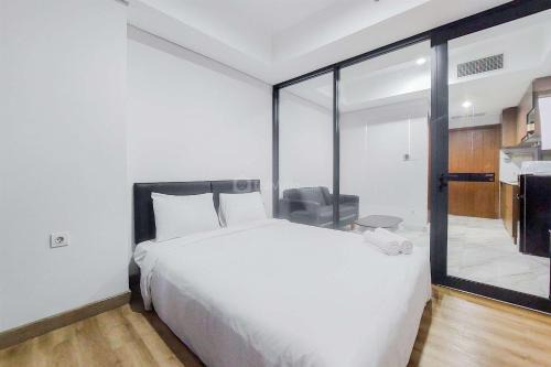 Pinang Appartement | Tranquil and Comfort Living 1BR The Smith Alam Sutera Apartment By Travelio