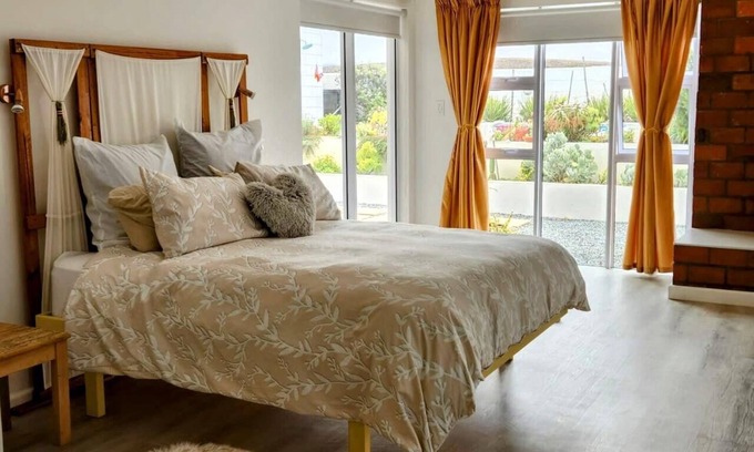 Grotto Bay Maison | Tranquil, family friendly West Coast vacation home in a private nature reserve
