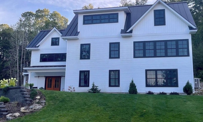 Lee Maison | Tranquil lakeside and trailside 5-bedroom house in Lee with gourmet kitchen.