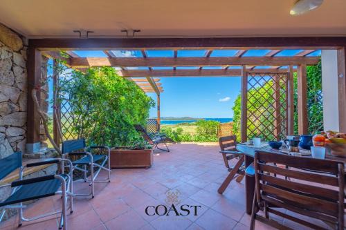 Portisco Appartement | Trilocale con giardino e vicino alla spiaggia