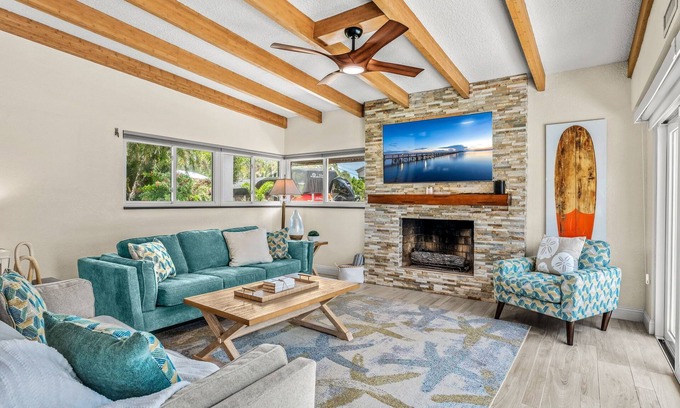 Cocoa Beach Maison | Tropical Backyard Oasis W/ Dock, BBQ Grill, Heated Pool, & Spa!