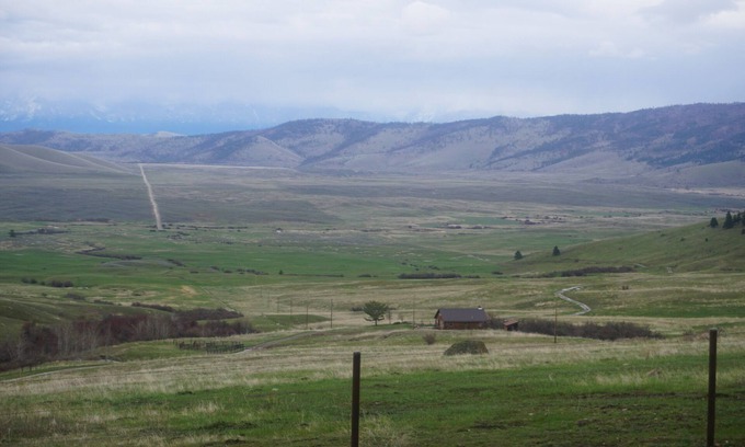 Glacier Country Cabine | Upscale cabin, 10000 acre cattle ranch. Views, abundant wildlife & hiking.
