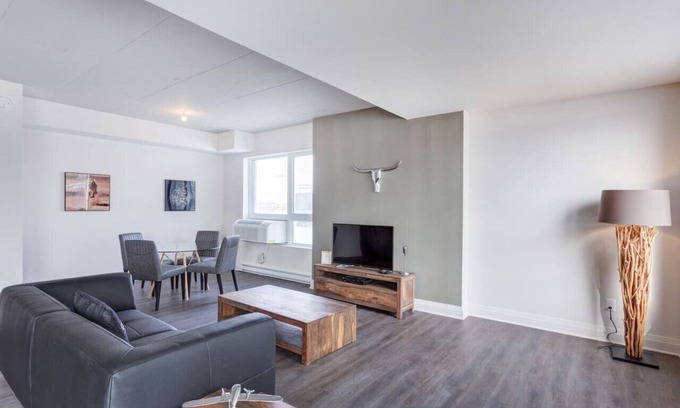 Laval Appartement | Urban 2BR Escape In-suite Laundry and Terrace