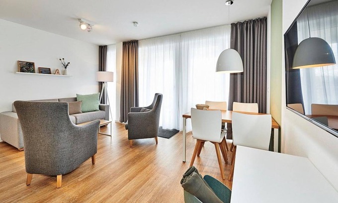 Bensersiel Appartement | Vacation apartment close to the beach with large balcony incl. use of swimming pool & sauna - Deichhäuser Anna