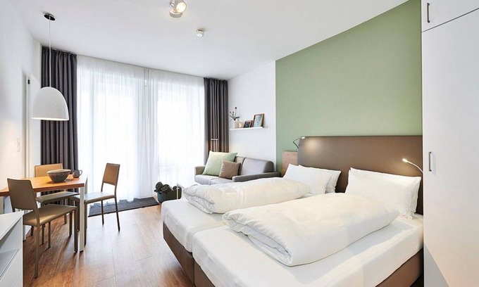Bensersiel Appartement | Vacation apartment near the beach with terrace incl. free use of swimming pool & sauna - Deichhäuser Anna