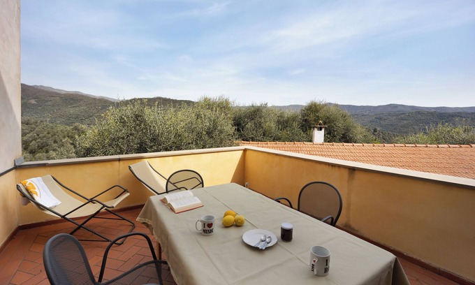 Bellissimi Maison | Maison de vacances 'Appartamento Camomilla' avec vue sur les montagnes, terrasse et Wi-Fi