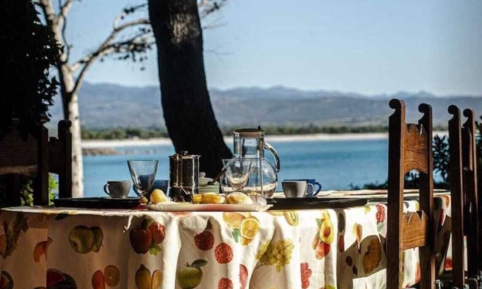 Porto Pino Villa | Maison de vacances 'Fronte Mare Al Porticciolo' avec vue sur la mer, barbecue et Wi-Fi