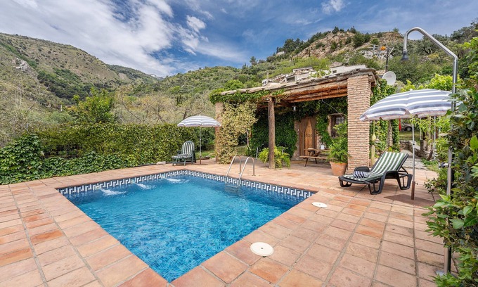 Orgiva Maison | Maison de vacances "La Terrera" avec vue sur les montagnes, piscine privée et Wi-Fi