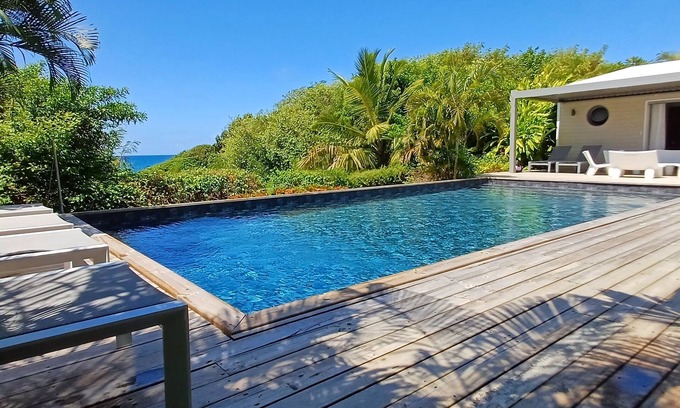 Grande-Terre Villa | Villa Piscine privée face à la mer - Accès plages depuis le jardin