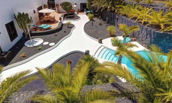 Teguise Villa | Villa de vacances 'El Cactus' avec piscine partagée et Wi-Fi