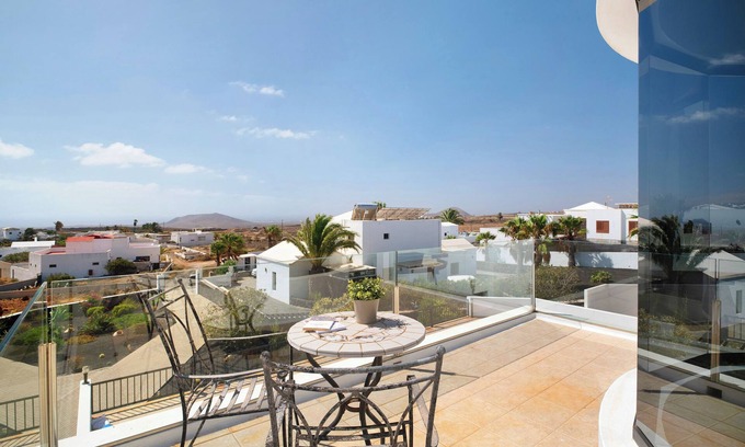 Teguise Villa | Vacation Villa 'Insitu' with Sea View, Private Terrace and Wi-Fi