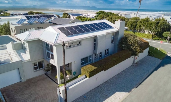 Voelklip Appartement | Villa Armonia | Grotto beach | Large sun deck with pool