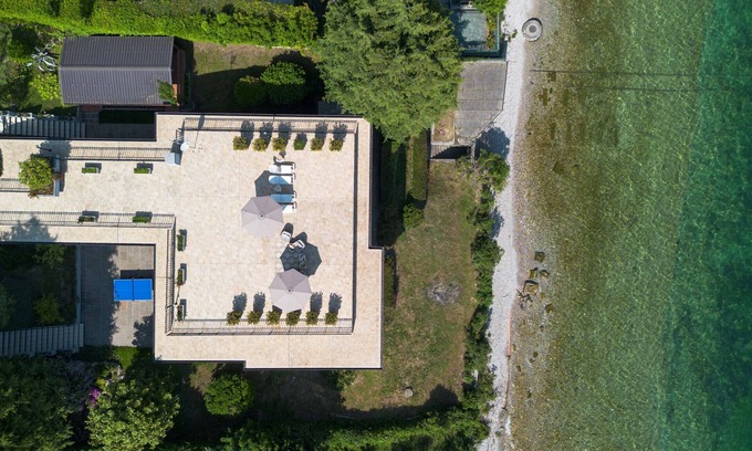 Moniga del Garda Villa | Villa au bord du lac unique avec grande piscine priv��e et vue imprenable sur le lac