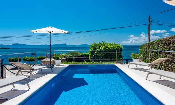 Alcanada Chalet De Ski | Villa FARO pour 8 personnes en face de la mer à Alcanada avec piscine