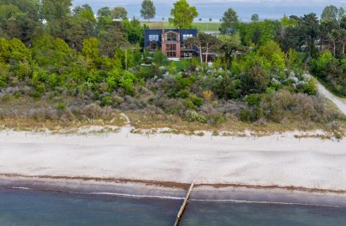 Hohe Dune Appartement | Villa Schmidt - Strandhaus direkt am Meer mit Sauna, Sport und Dünengarten I