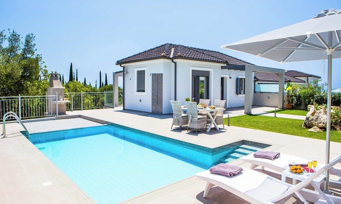 Leivathos Villa | Villa Terra - Cette villa comprend vue sur la mer, piscine privée et WIFI