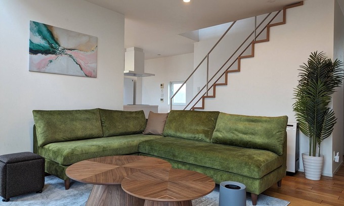 Naganuma Maison | Villa with glass atrium living room / Yubari-gun Hokkaidō