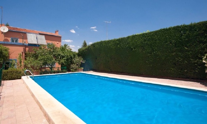 Dos Hermanas Maison | Villa avec piscine privée et 1 000 m2 de jardins et orange