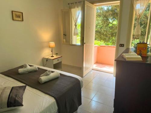 Tonnarella Appartement | Villaggio Portorosa - La casetta tra le palme 18